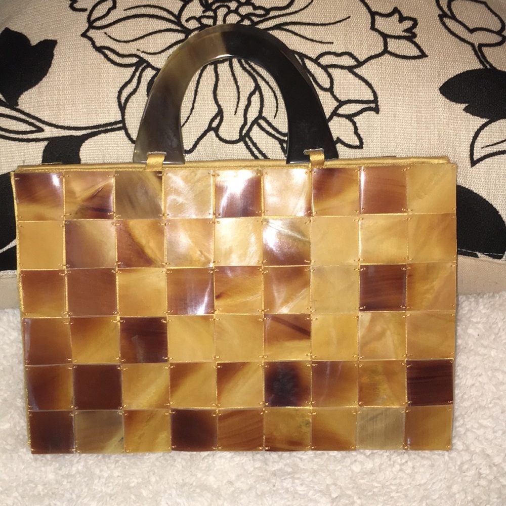 Amber color tiled hand bag